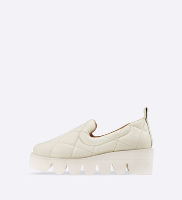 Sneaker Nicky em couro matelassê marfim
